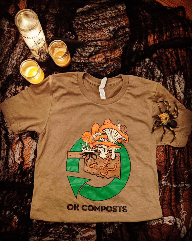 photo of OK Composts brown t-shirt near candles